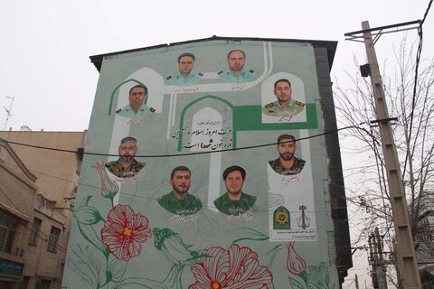 تمثال شهدای نیروی انتظامی بر دیوار مجاور بلوار بلال نقش بست