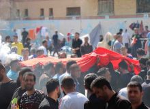 پرچم حرم مطهر امام حسین بر سر زندانیان کرجی به اهتزاز درآمد