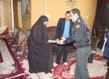 دیدار فرمانده انتظامی شهرستان اشتهارد با خانواده معظم شهدا