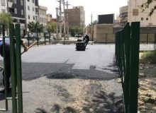 اجرای عملیات آسفالت زمین ورزشی روباز در بوستان جهان
