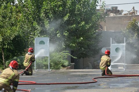 مسابقات عملیاتی ورزشی آبرسانی آتش نشانان کرجی برگزار شد