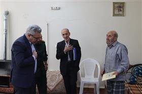 دیدار فرمانده بسیج با خانواده شهید نیکبخت