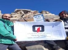 پرچم آتش‌نشانی کرج بر فراز علم‌کوه افراشته شد